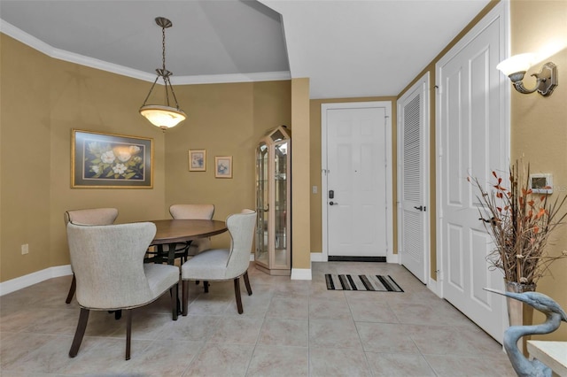 tiled dining area with crown molding