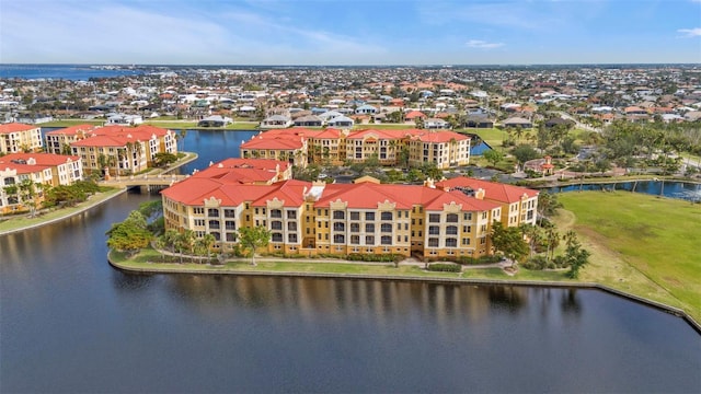 drone / aerial view with a water view