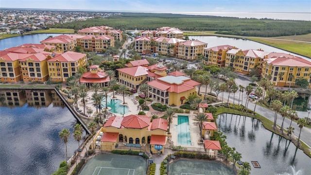 birds eye view of property featuring a water view