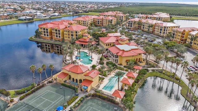 drone / aerial view with a water view