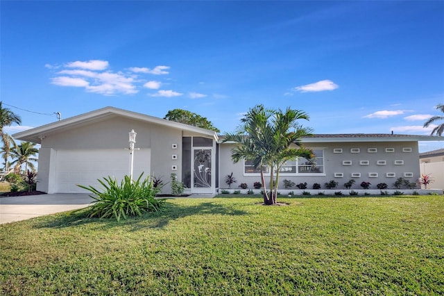 ranch-style home featuring a front lawn and a garage