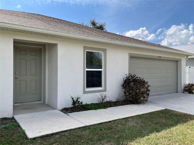 entrance to property with a garage