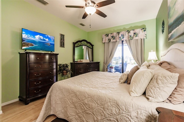 bedroom with ceiling fan, light hardwood / wood-style floors, and access to exterior