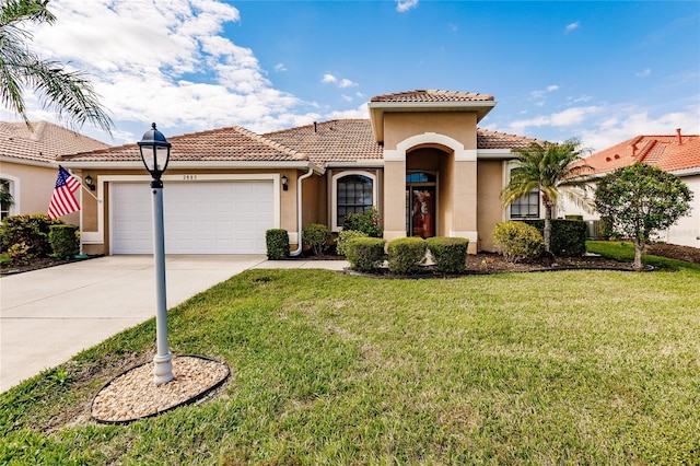 mediterranean / spanish-style home with concrete driveway, a tile roof, an attached garage, a front lawn, and stucco siding