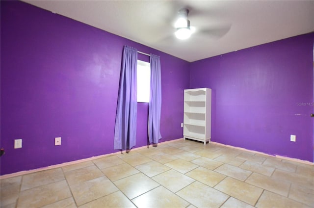 spare room featuring ceiling fan