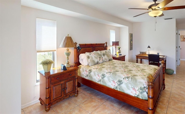 bedroom featuring ceiling fan and light tile patterned floors