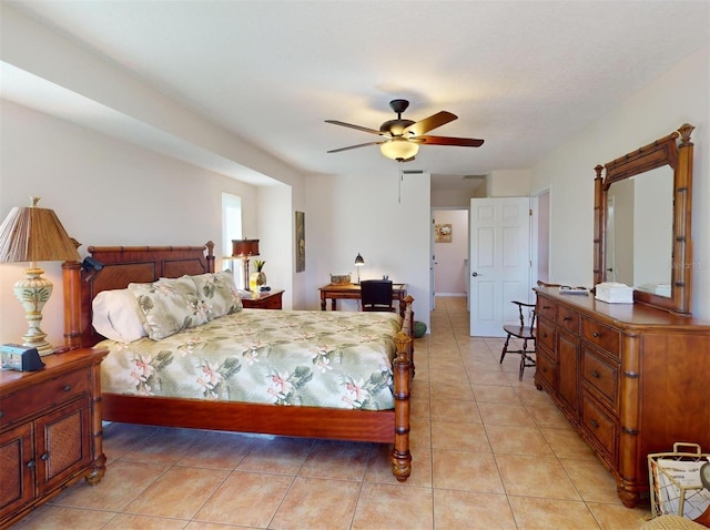 bedroom with ceiling fan and light tile patterned flooring