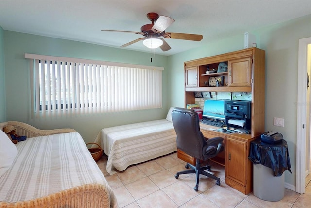 bedroom featuring ceiling fan and light tile patterned flooring