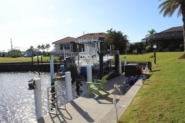 view of dock featuring a water view and a lawn