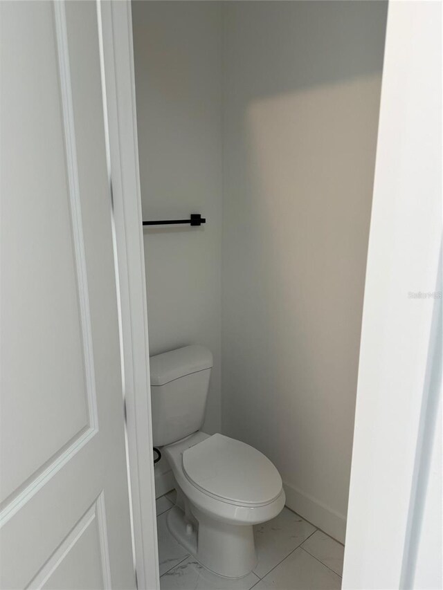 bathroom featuring toilet