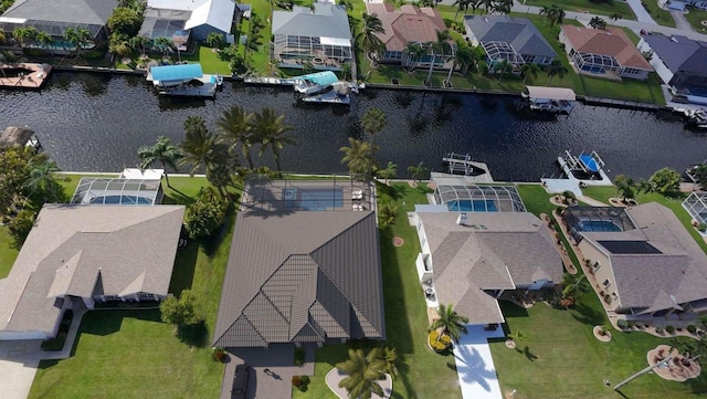 drone / aerial view with a water view