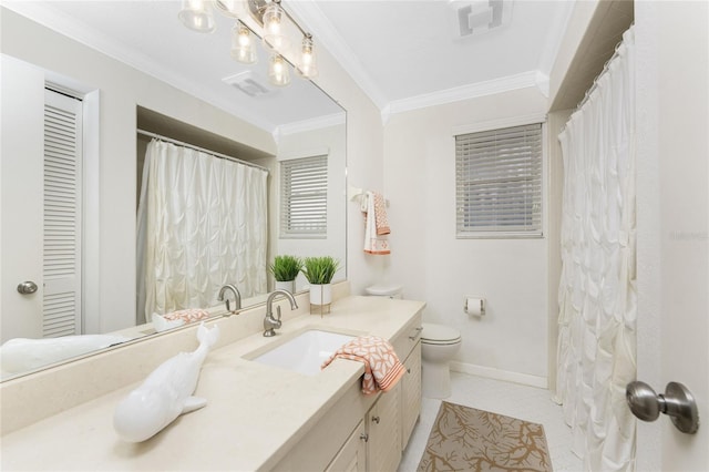 bathroom with tile patterned flooring, vanity, toilet, and crown molding