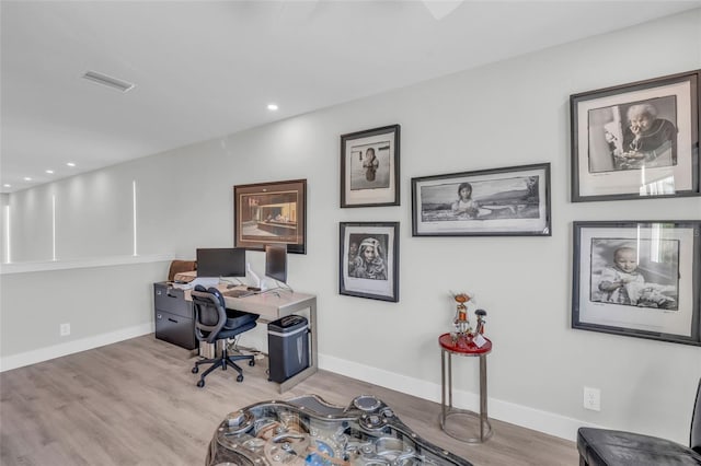 home office featuring light hardwood / wood-style floors