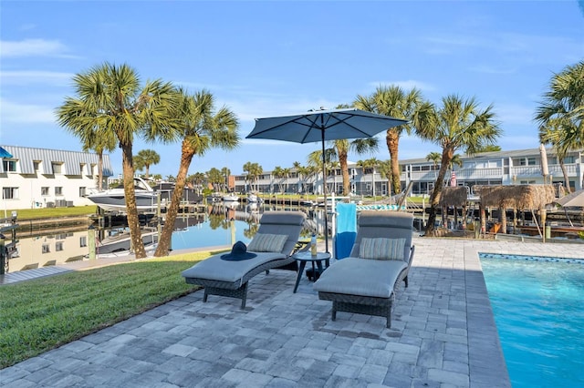 view of patio / terrace with a water view