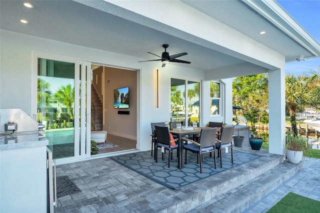 view of patio / terrace with ceiling fan