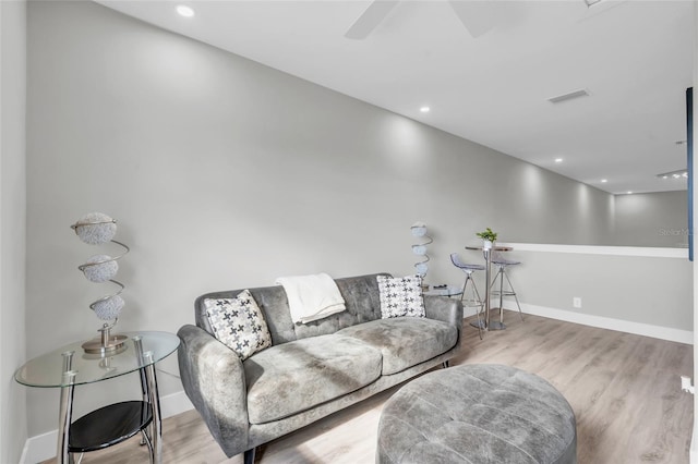 living room with light hardwood / wood-style flooring