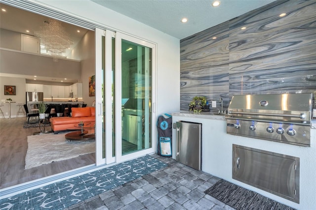 interior space with sink, area for grilling, and a grill