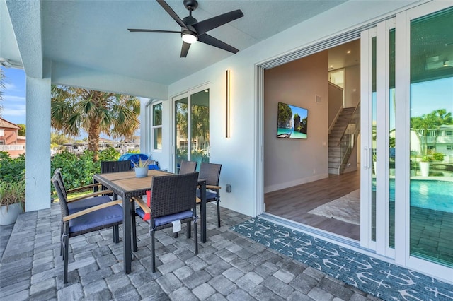 view of patio with ceiling fan