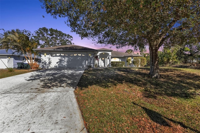 ranch-style house with a garage