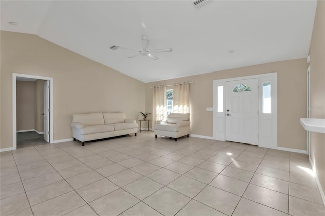 tiled foyer featuring ceiling fan and lofted ceiling