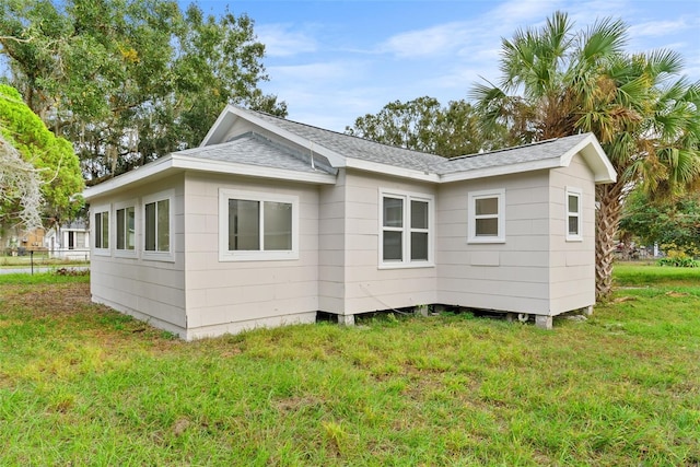 view of property exterior featuring a yard