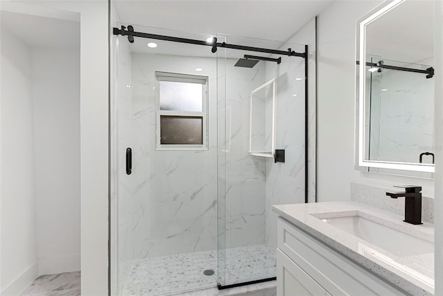 bathroom featuring vanity and walk in shower