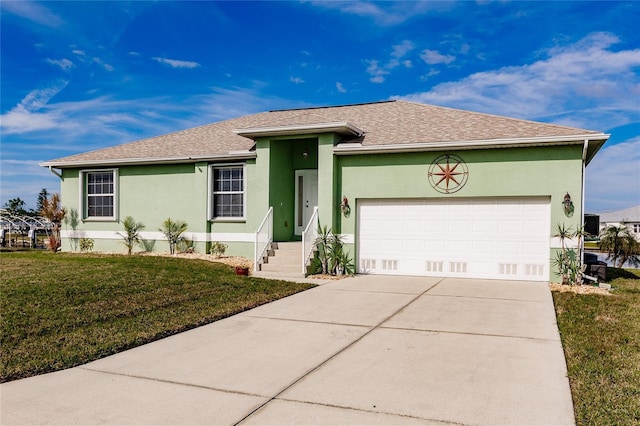 ranch-style house featuring a front lawn and a garage