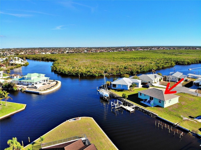 drone / aerial view featuring a water view