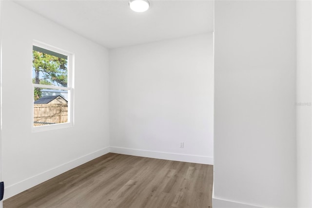 spare room with light hardwood / wood-style flooring