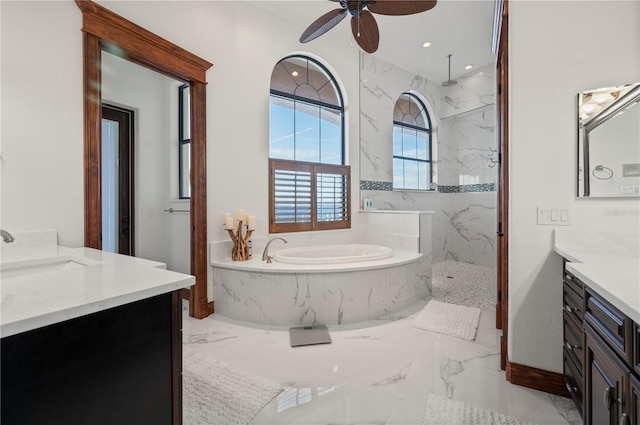 bathroom with vanity, separate shower and tub, and ceiling fan