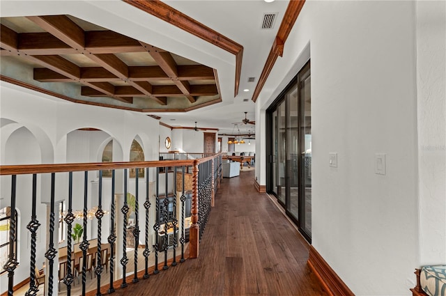 hallway featuring beamed ceiling, dark hardwood / wood-style floors, and coffered ceiling