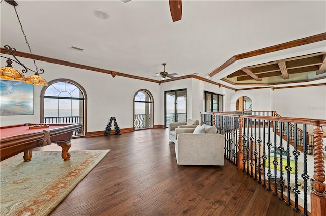 interior space featuring ceiling fan, dark hardwood / wood-style floors, crown molding, and billiards