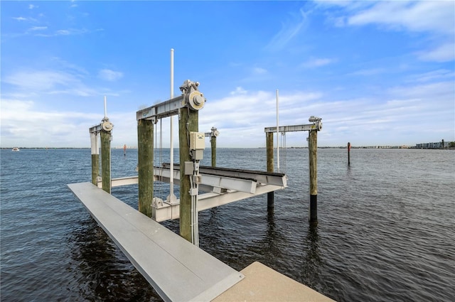 dock area featuring a water view