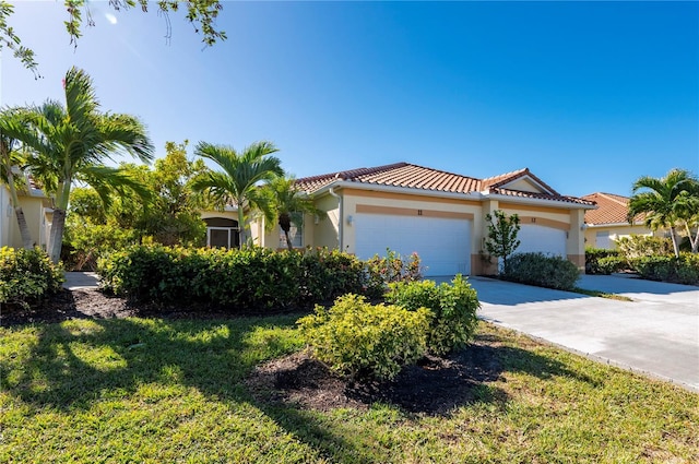 mediterranean / spanish-style home featuring a garage