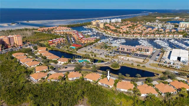 birds eye view of property featuring a water view