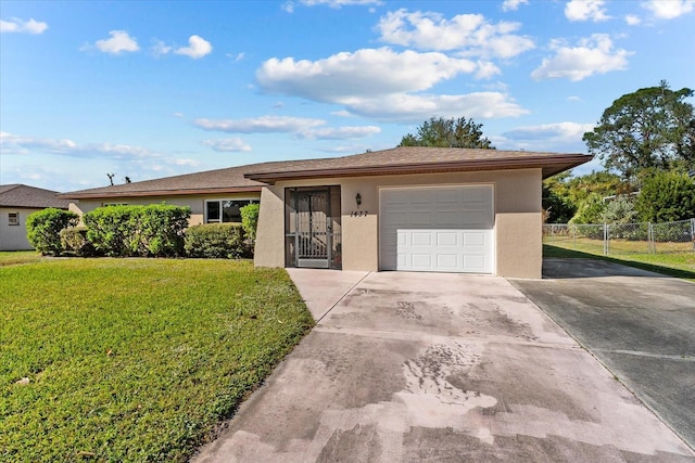 single story home with a front lawn and a garage