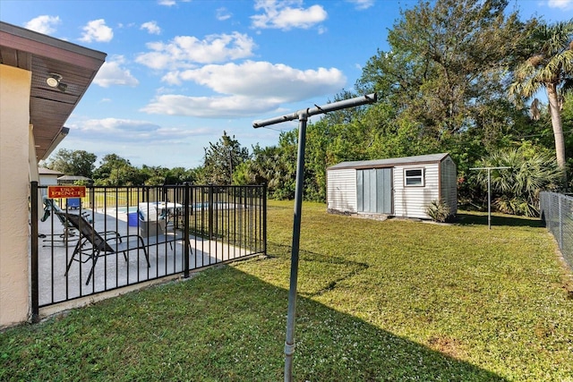 view of yard with a patio area and a shed