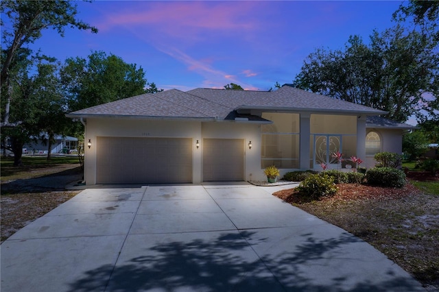 view of front of property featuring a garage