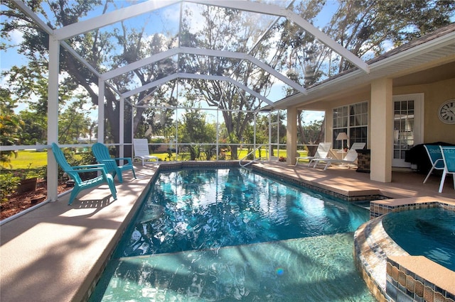 view of swimming pool with an in ground hot tub, glass enclosure, a patio area, and a grill