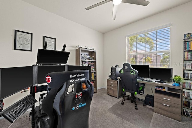 home office featuring ceiling fan and light colored carpet