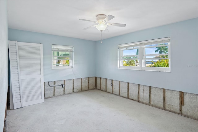 unfurnished room featuring ceiling fan