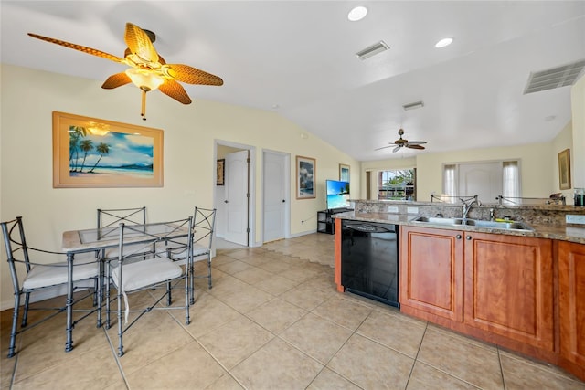 kitchen featuring ceiling fan, sink, black dishwasher, vaulted ceiling, and light tile patterned floors