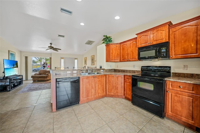 kitchen with kitchen peninsula, ceiling fan, sink, black appliances, and lofted ceiling