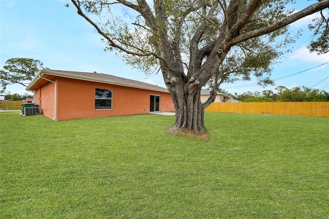 view of yard featuring central AC