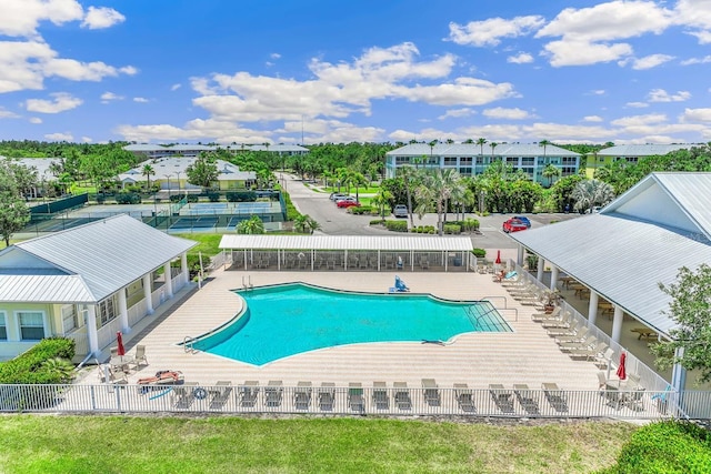 view of swimming pool with a patio