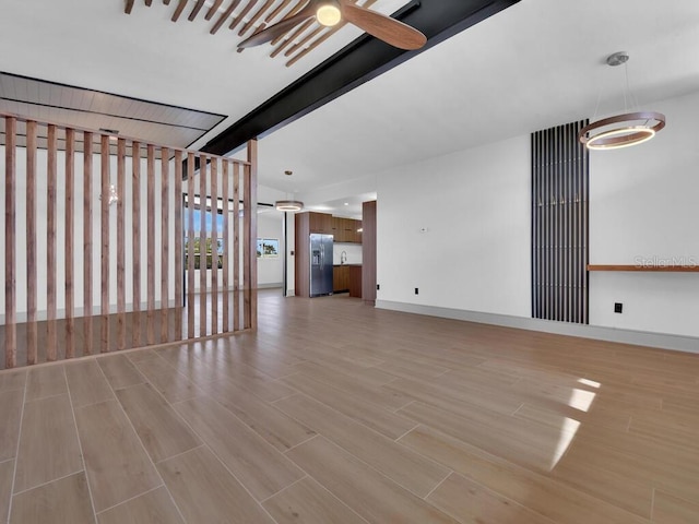 unfurnished living room featuring light hardwood / wood-style flooring