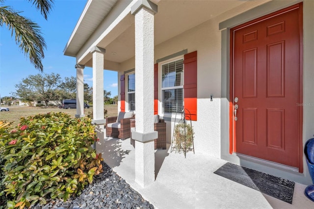 property entrance with a porch