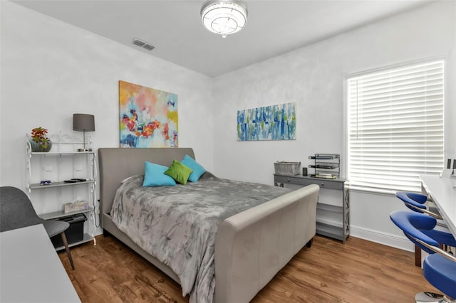 bedroom featuring hardwood / wood-style flooring