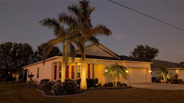 view of front of home with a garage