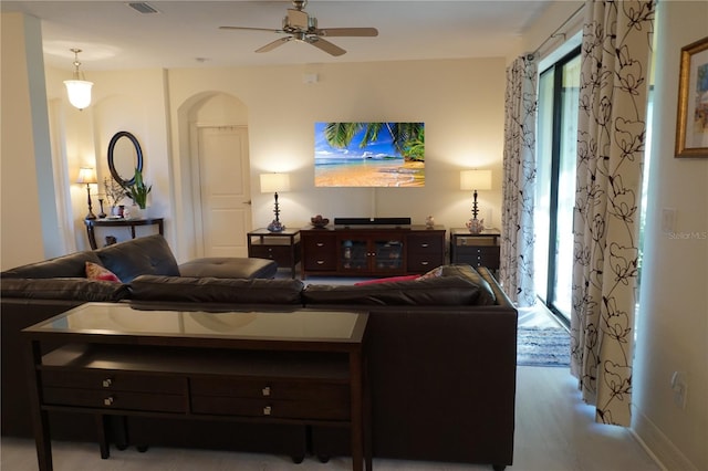 living room with ceiling fan